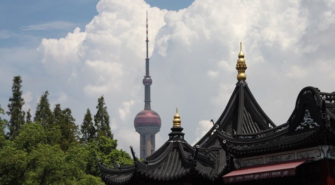 Pearl Tower, Shanghai, with traditional Chinese buildings in the foreground