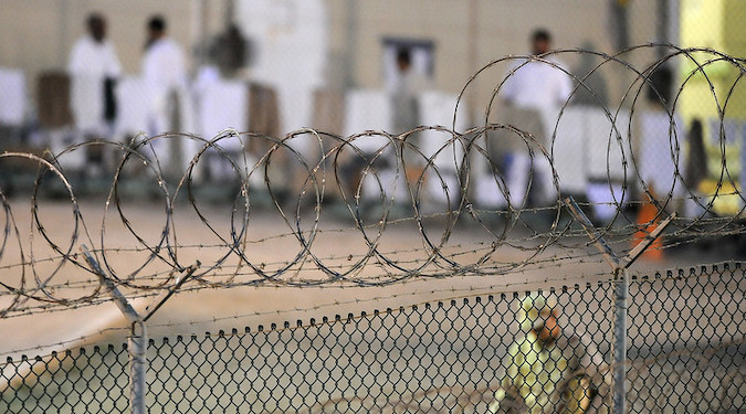 Military personnel and prisoners at the Guantanamo military commission